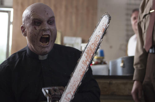 Nick Hood as Reverend Chainsaw - Frankenstein Created Bikers